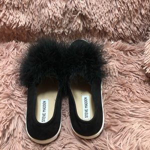 Steve Madden black slip on sneaker.The shoes are Perfect no tear or rips